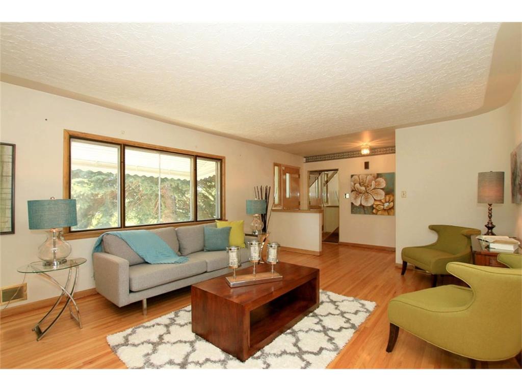 2 bdrms up and 2 bdrms down, single garage family home in Highland Park!