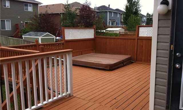 Exterior Back. Deck with Hot-tub